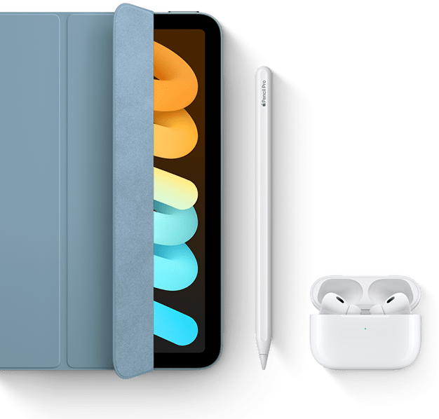 iPad mini pokazany w użyciu z etui Smart Folio, Apple Pencil Pro i AirPods Pro